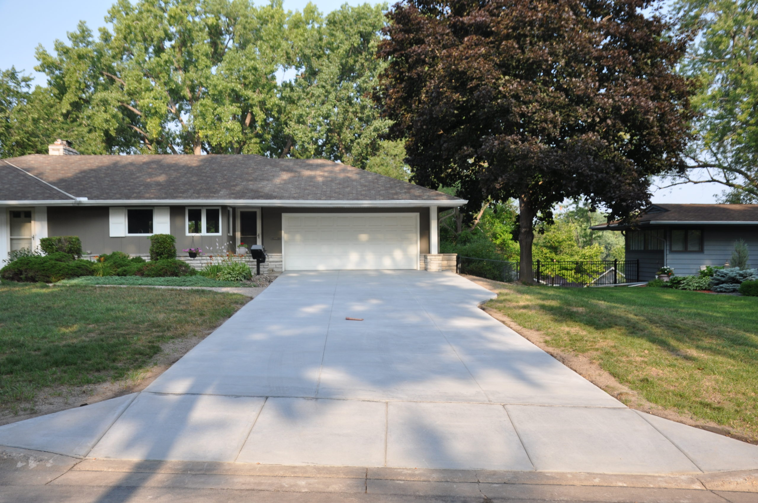 Driveway and Stamped Patio Made Smooth and Stunning in Golden Valley, MN